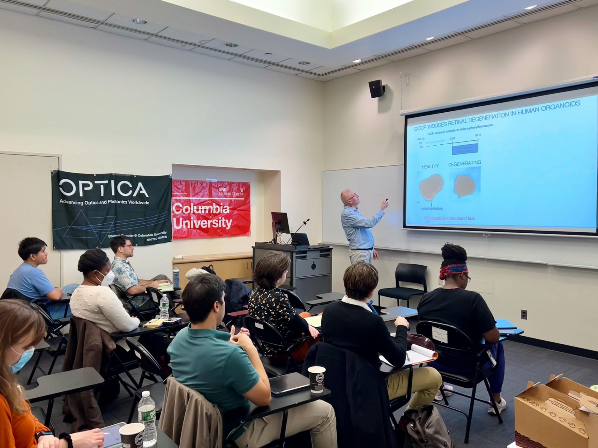 Prof. Jurgen Czarske giving a guest lecturer talk to Optica/SPIE Student Chapter Members